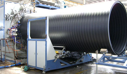 Line for the production of hollow spiral tubes of large diameters of polyethylene